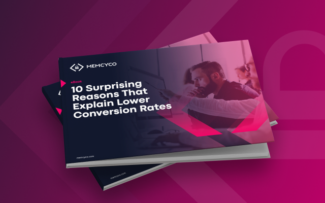 A digital booklet titled “10 Surprising Reasons That Explain Lower Conversion Rates” by Memcyco rests on top of two stacked booklets against a pink gradient background, uncovering key conversion rate reasons.